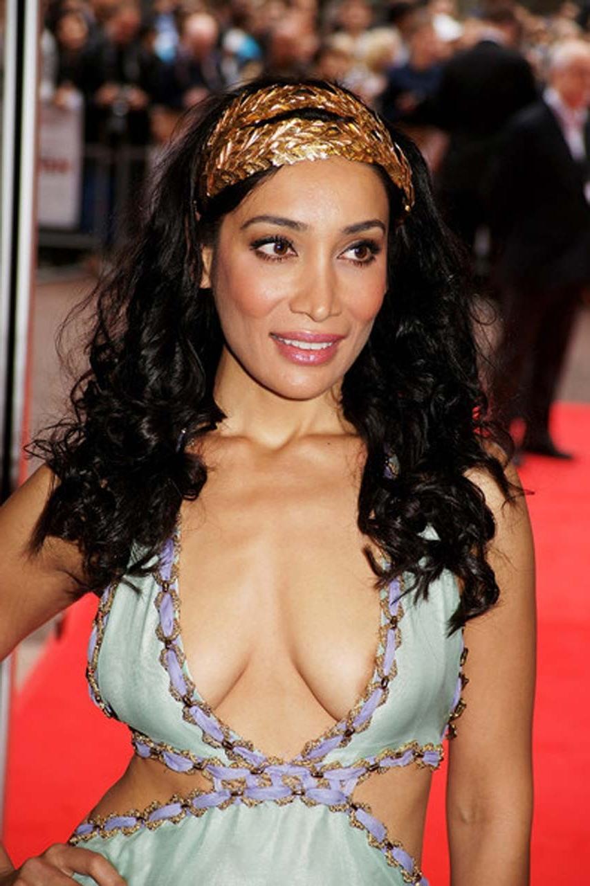 16P Sofia Hayat showing her ass in low cut dress and big cleavage paparazzi pictures