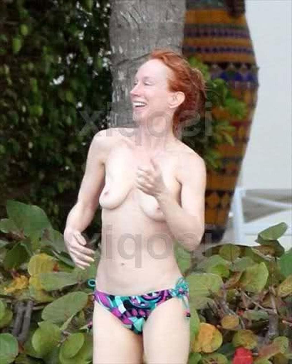 16P Kathy Griffin exposing her nice boobs topless dancing by the pool paparazzi pict