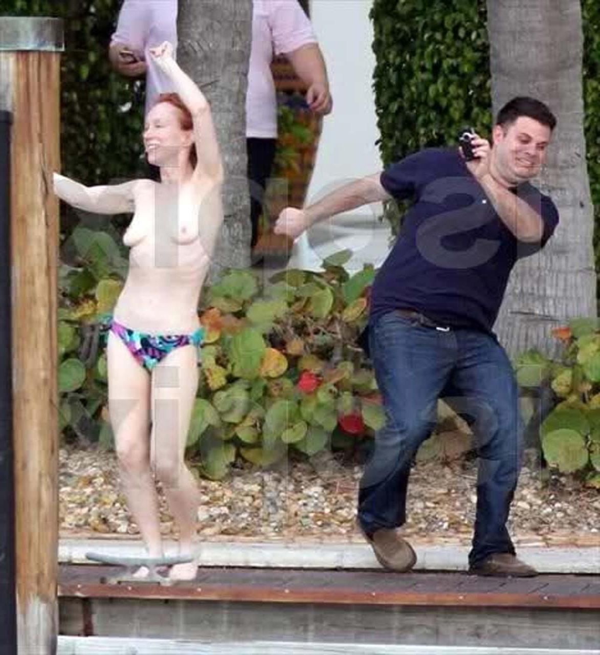 16P Kathy Griffin exposing her nice boobs topless dancing by the pool paparazzi pict