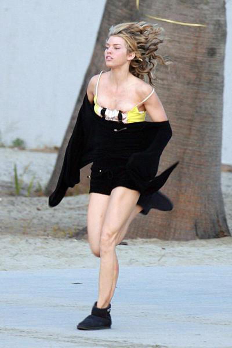 16P Annalynne McCord slipping a nipple while running