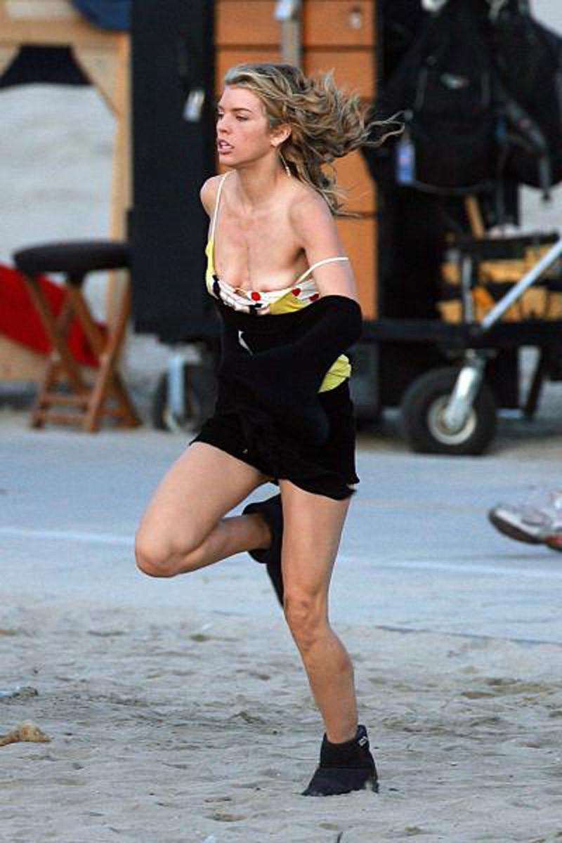 16P Annalynne McCord slipping a nipple while running