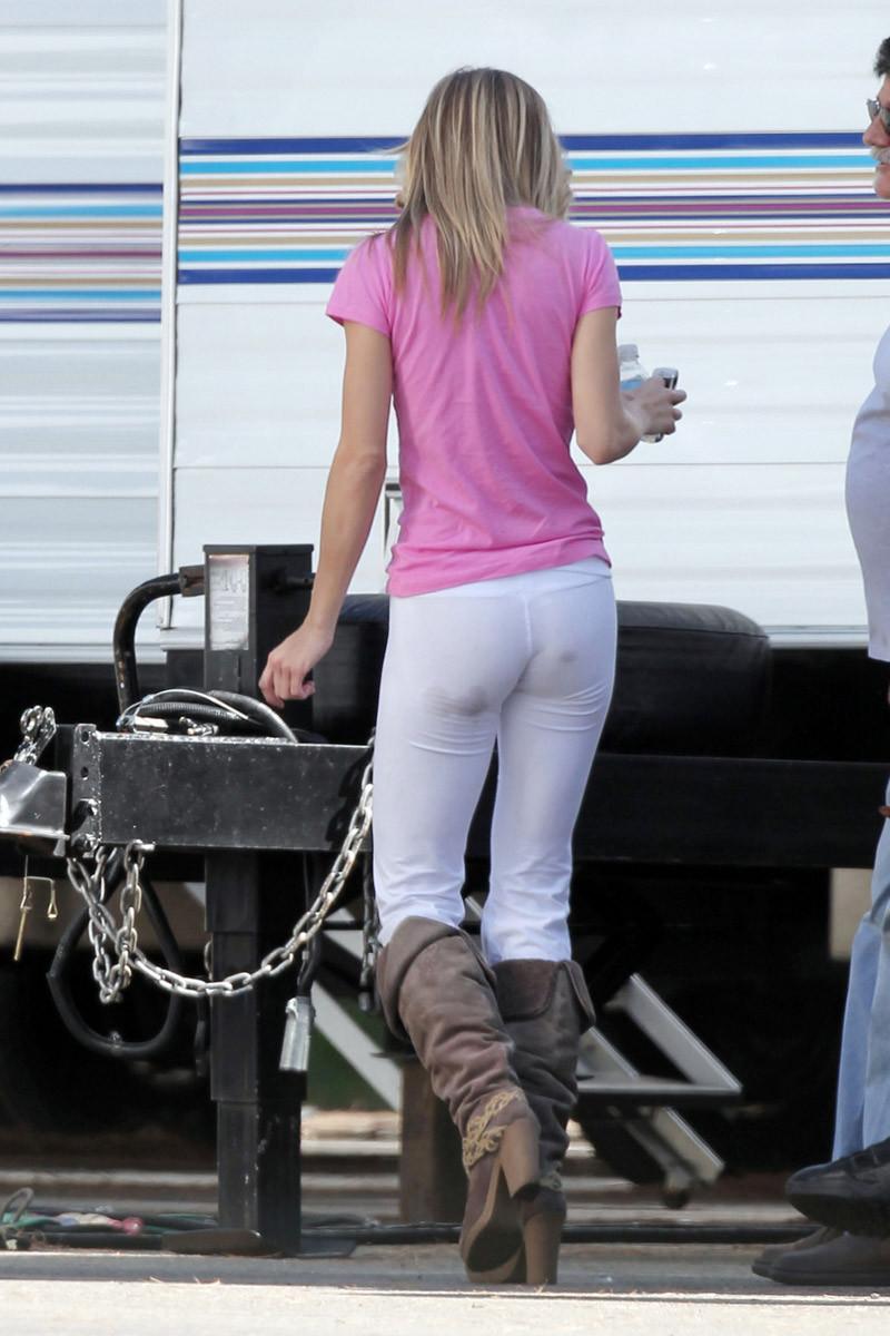 16P Annalynne McCord slipping a nipple while running