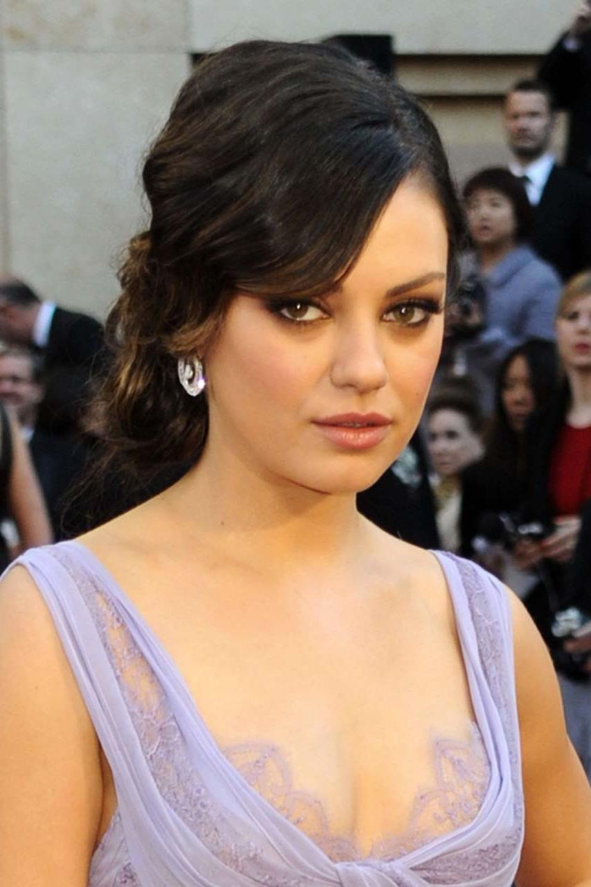 16P Mila Kunis exposing her sexy body and nice cleavage in see thru dress