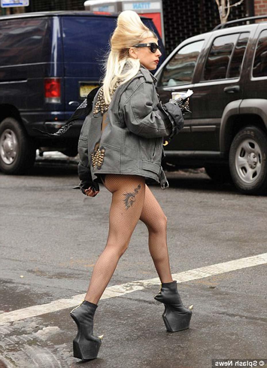 16P Lady Gaga exposing her tits in see thru dress on stage paparazzi pictures