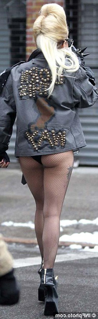 16P Lady Gaga exposing her tits in see thru dress on stage paparazzi pictures