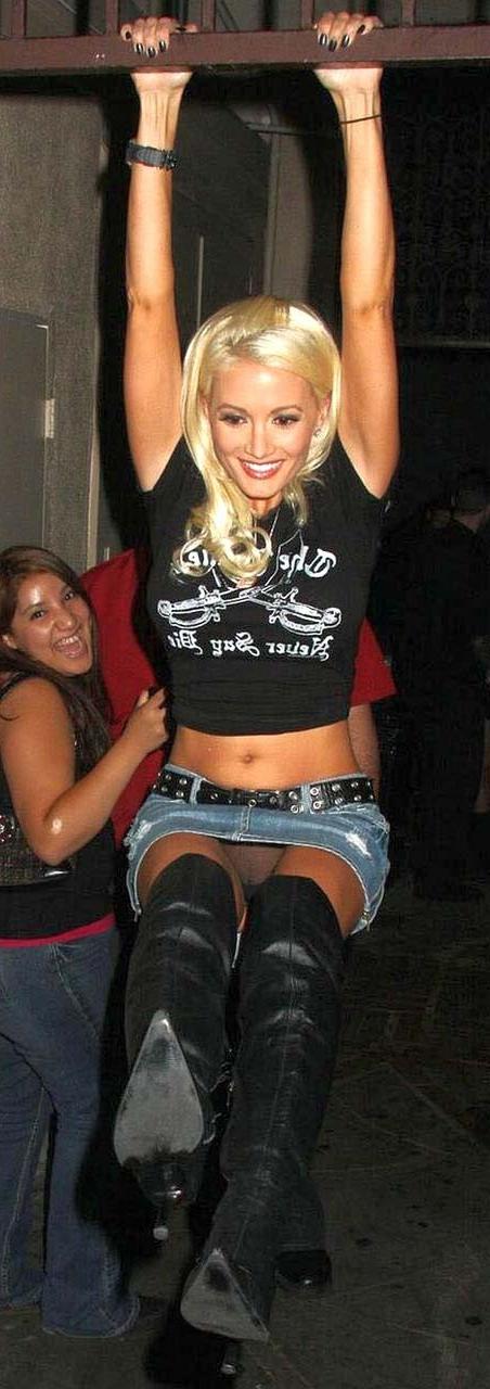 10P Holly Madison showing massive cleavage and flashing her bare pussy upskirt papar