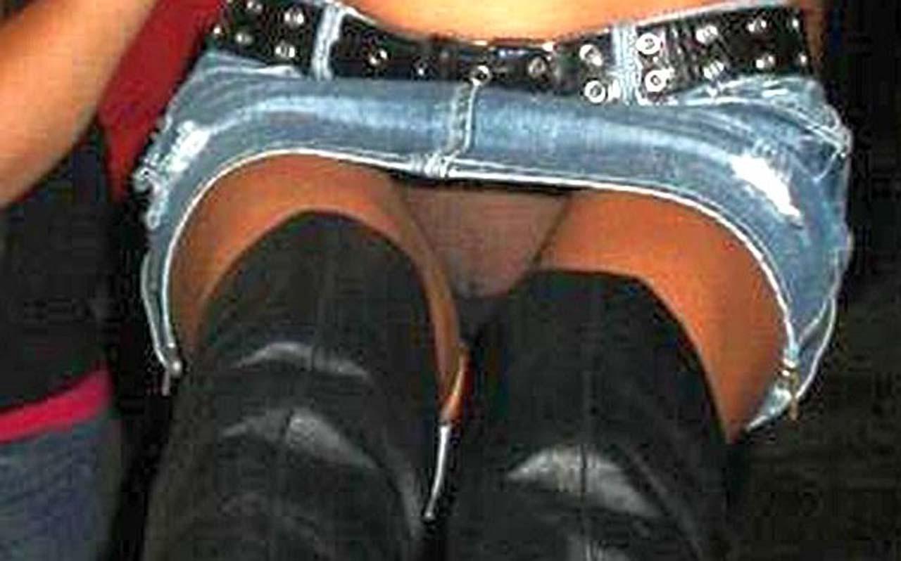 10P Holly Madison showing massive cleavage and flashing her bare pussy upskirt papar