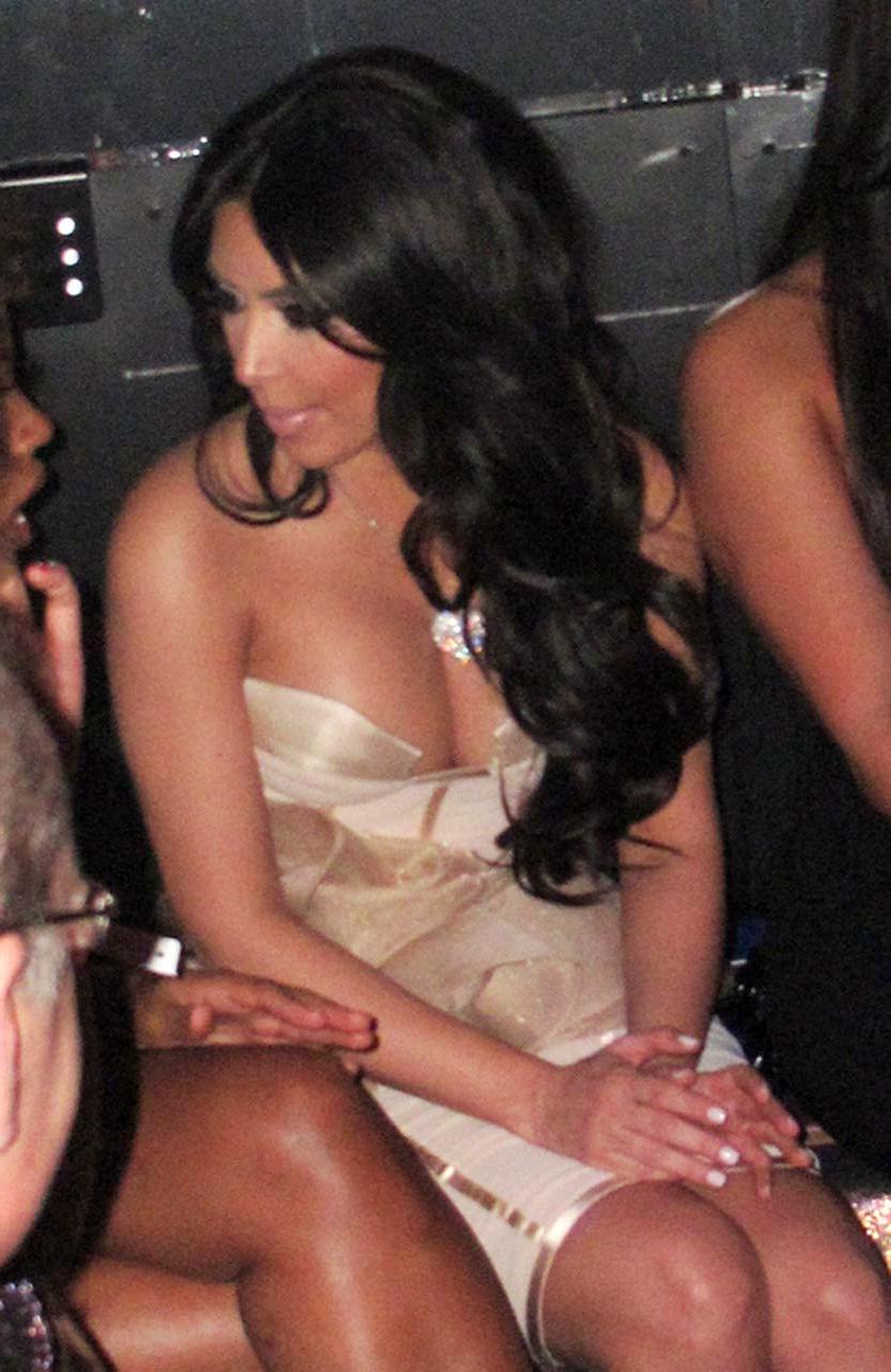 10P Kim Kardashian showing big cleavage in tight dress paparazzi pictures and exposi