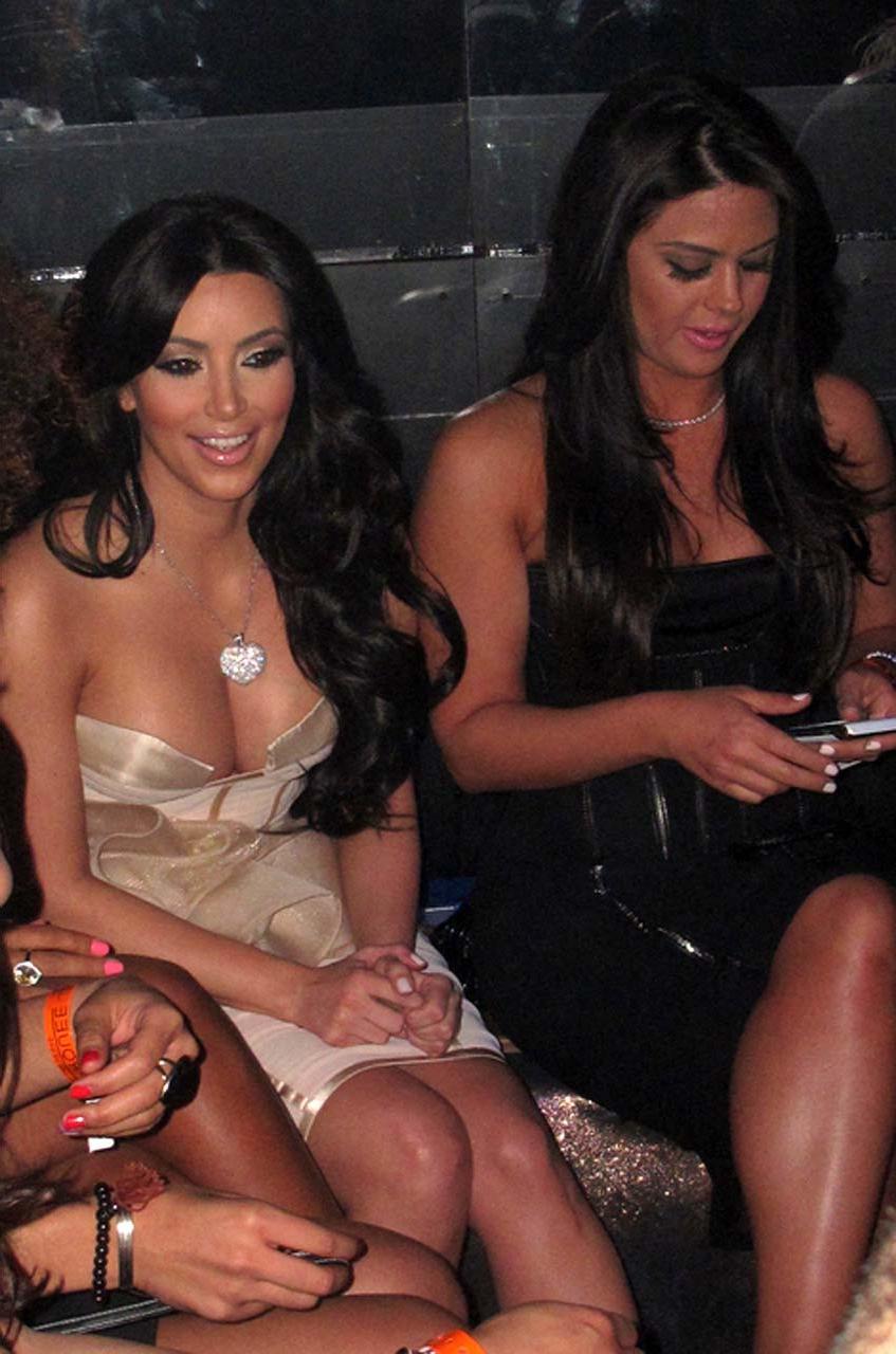 10P Kim Kardashian showing big cleavage in tight dress paparazzi pictures and exposi