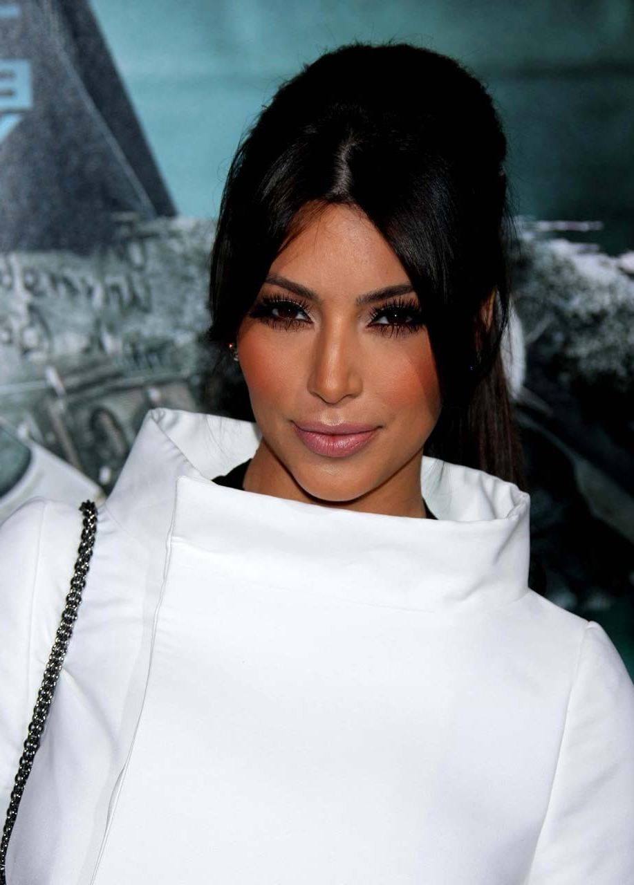 10P Kim Kardashian showing big cleavage in tight dress paparazzi pictures and exposi
