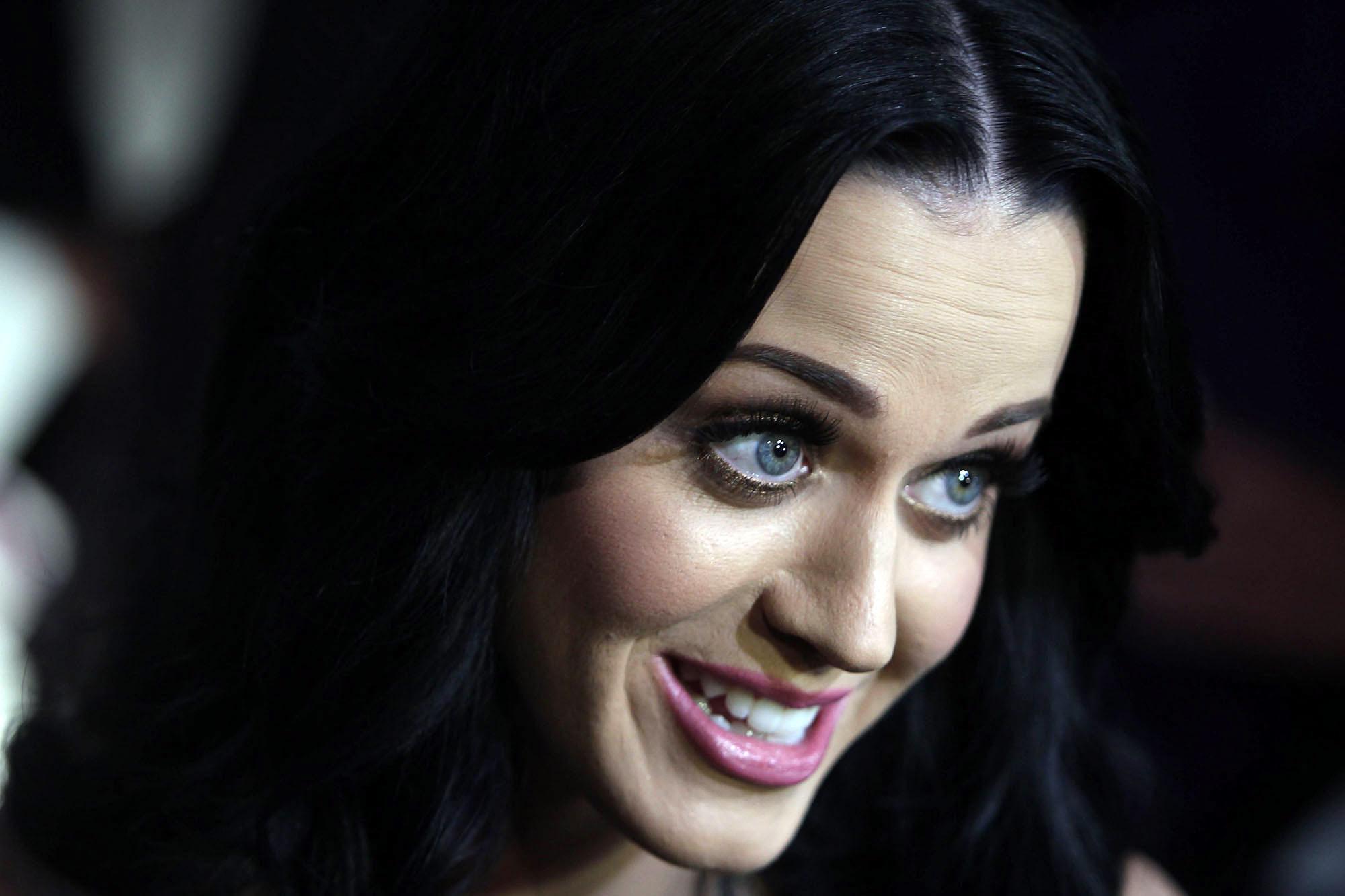 16P Katy Perry showing massive cleavage at The Purple Carpet Party for her new fragr