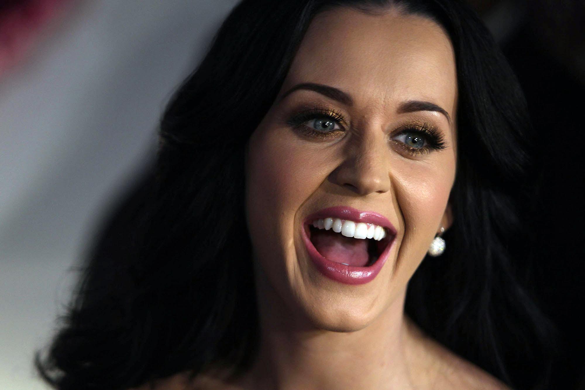 16P Katy Perry showing massive cleavage at The Purple Carpet Party for her new fragr