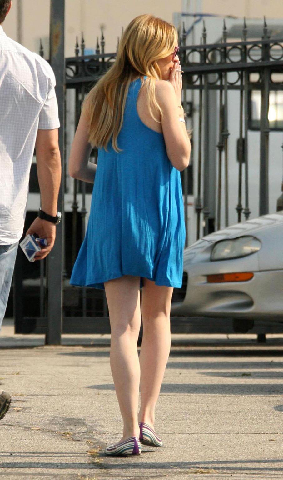 16P Lindsay Lohan looking cute in sexy summer dresses and showing huge cleavage