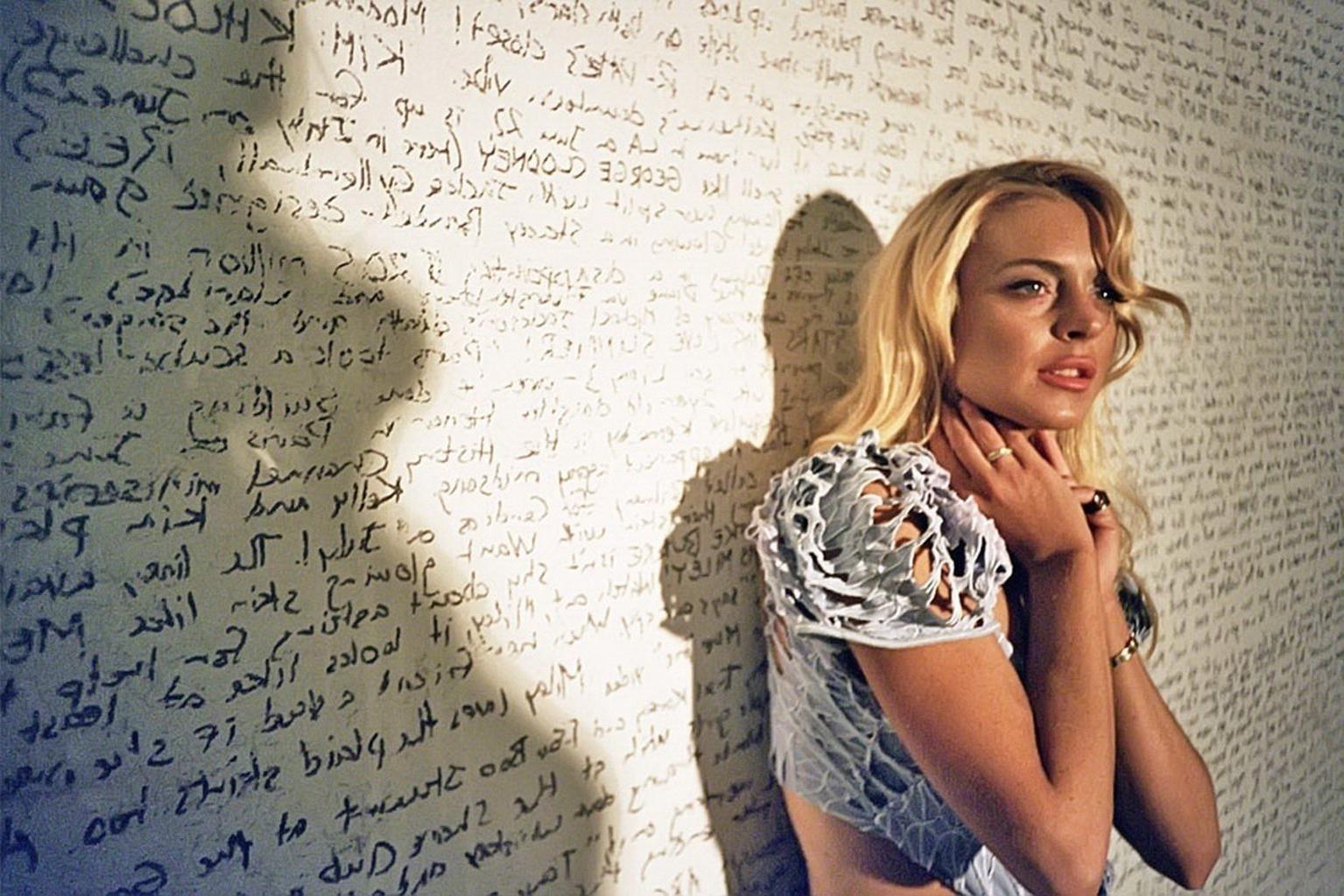 16P Lindsay Lohan showing huge cleavage in Benn Jaye Photoshoot 2010
