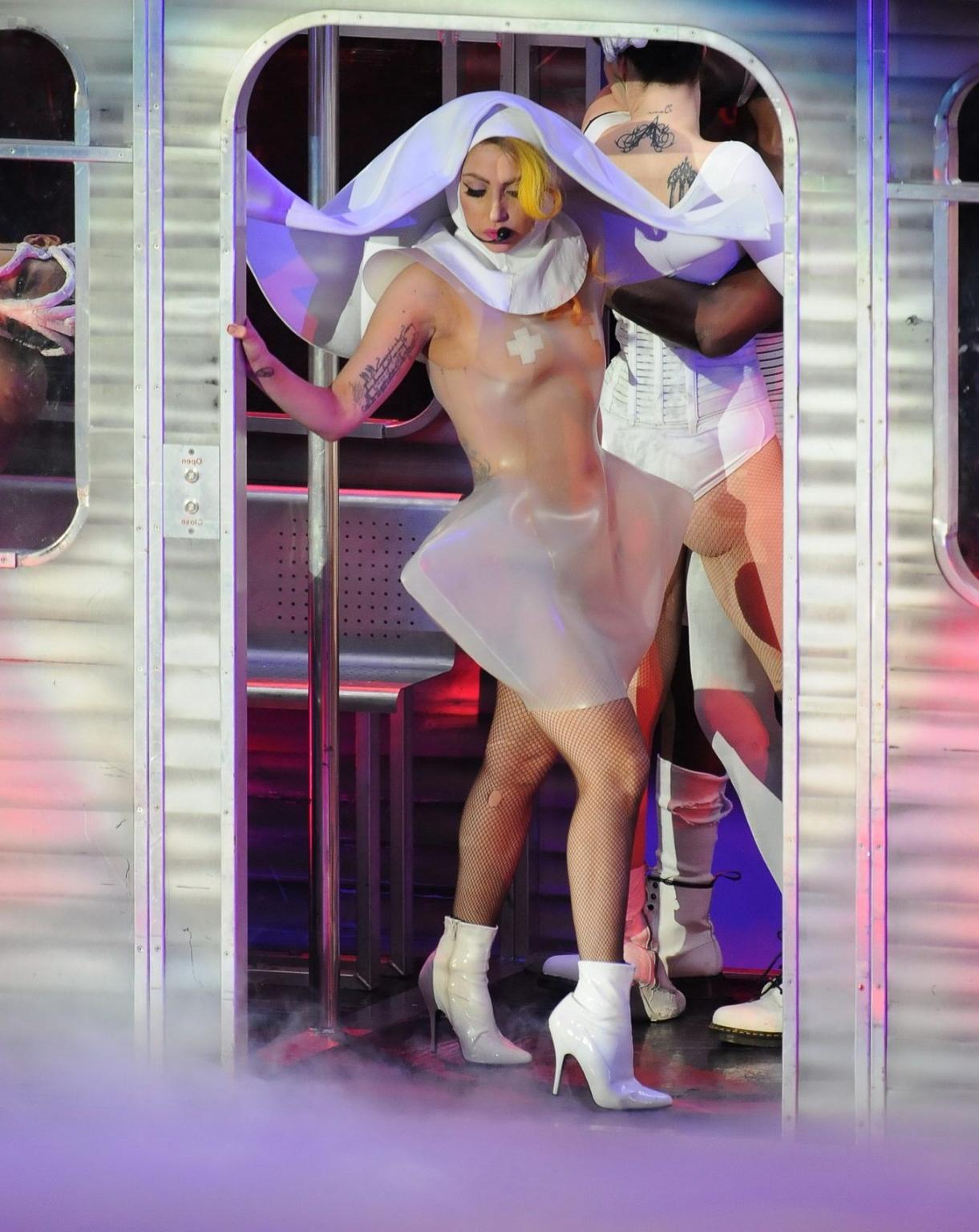 16P Lady Gaga in see through outfit with taped nipples performing at the 02 Arena in