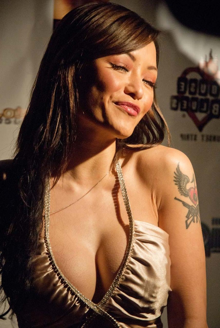 10P Tila Tequila showing huge cleavage and posing sexy for paparazzi