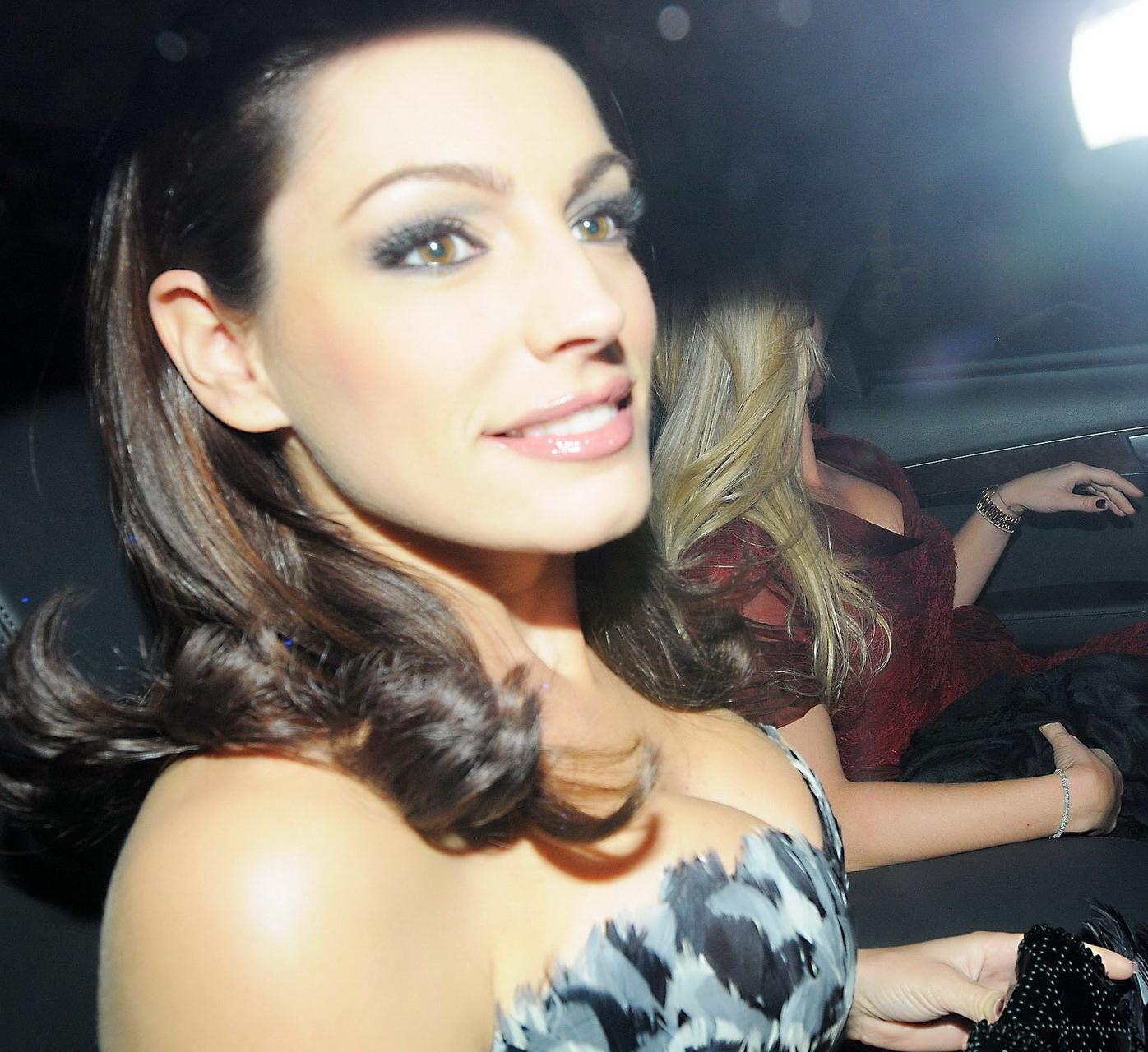 16P Kelly Brook showing huge cleavage at Dior Private Dinner in London