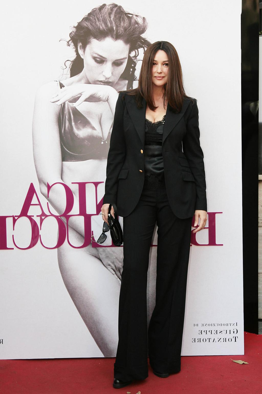 12P Monica Bellucci showing huge cleavage at her book 'Monica Bellucci by Monica Bel
