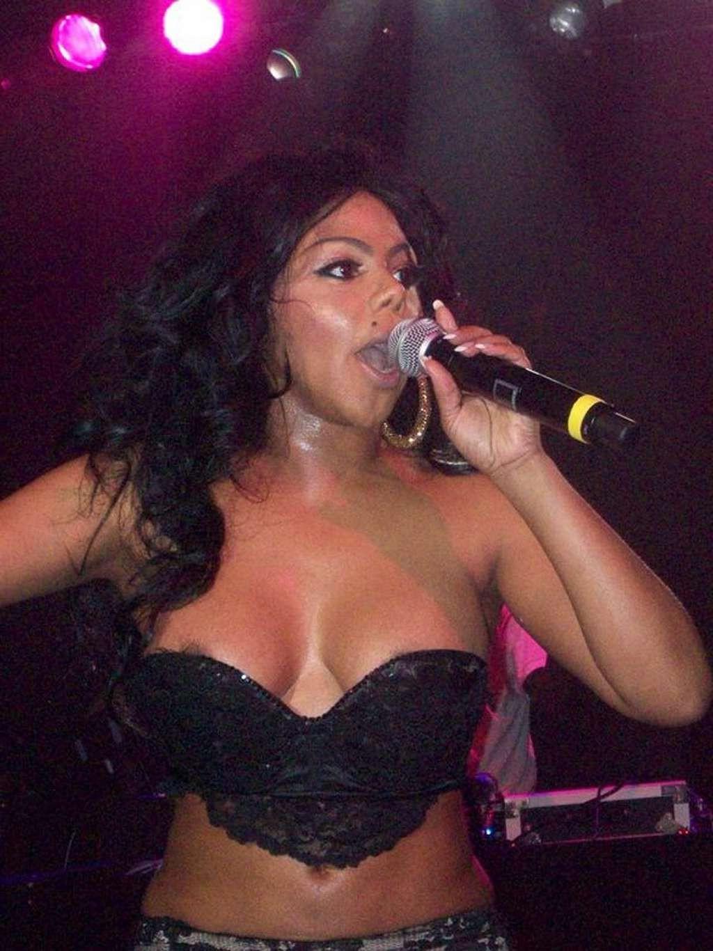 10P Lil Kim nipple slip paparazzi shoots and looking very hot in mini skirt