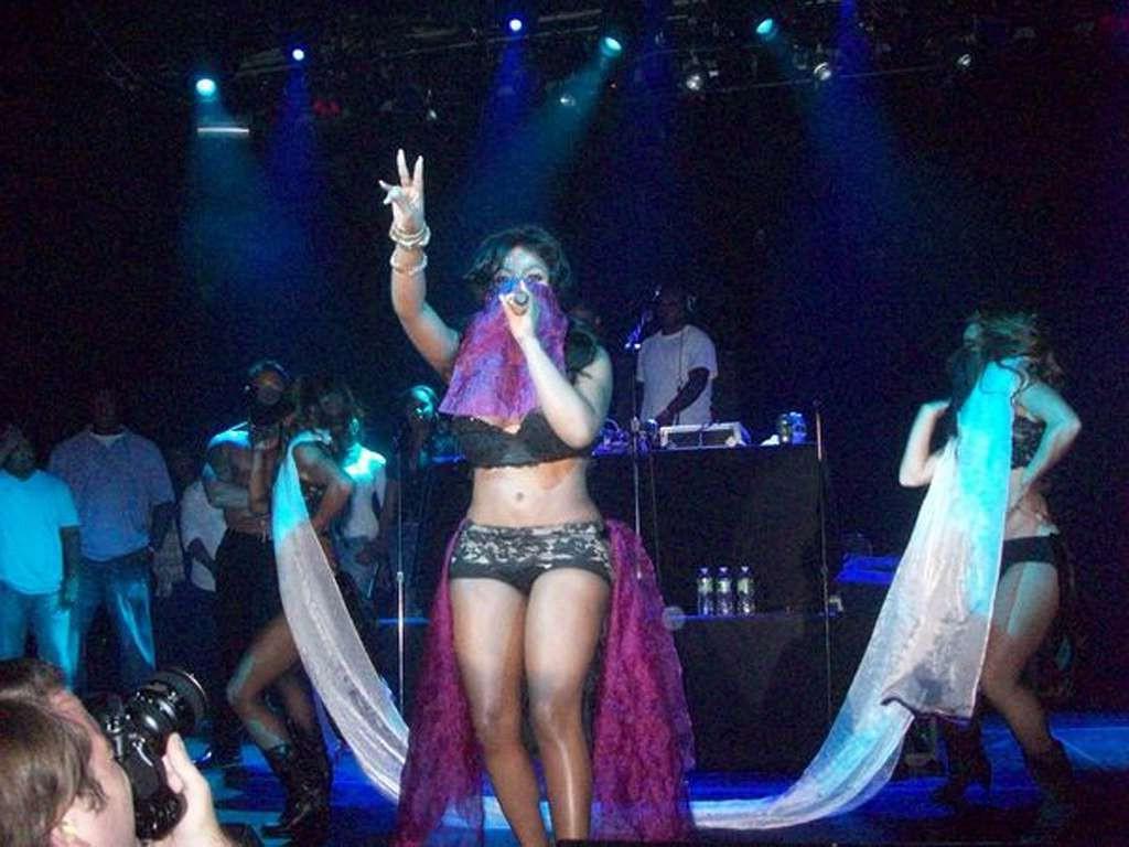 10P Lil Kim nipple slip paparazzi shoots and looking very hot in mini skirt