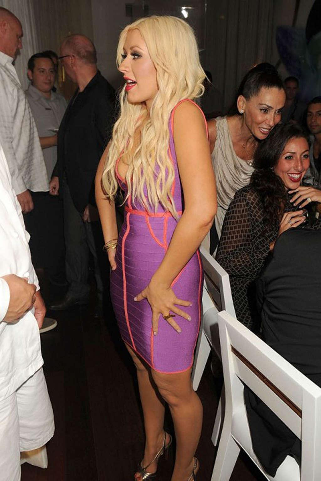 16P Christina Aguilera exposing her sexy body and huge cleavage in nice dress