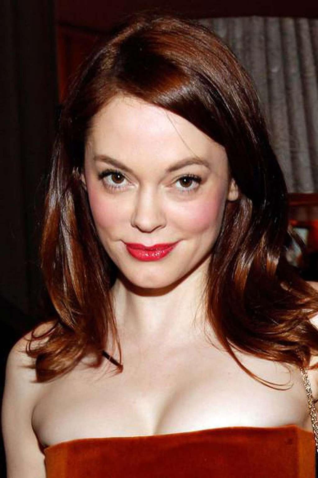 10P Rose McGowan showing her big cleavage and leggy in mini skirt paparazzi shoots