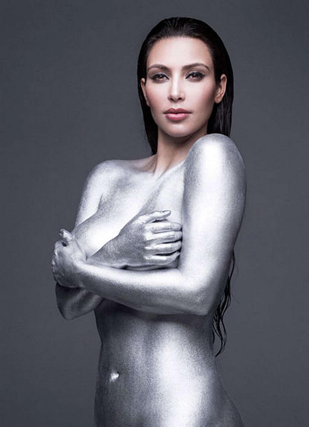 16P Kim Kardashian exposing sexy nude body and huge cleavage while going to yoga cla