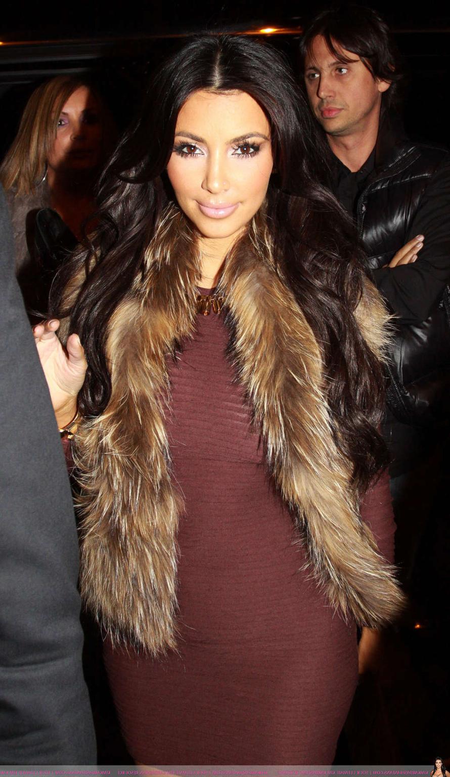 16P Kim Kardashian exposing sexy nude body and huge cleavage while going to yoga cla