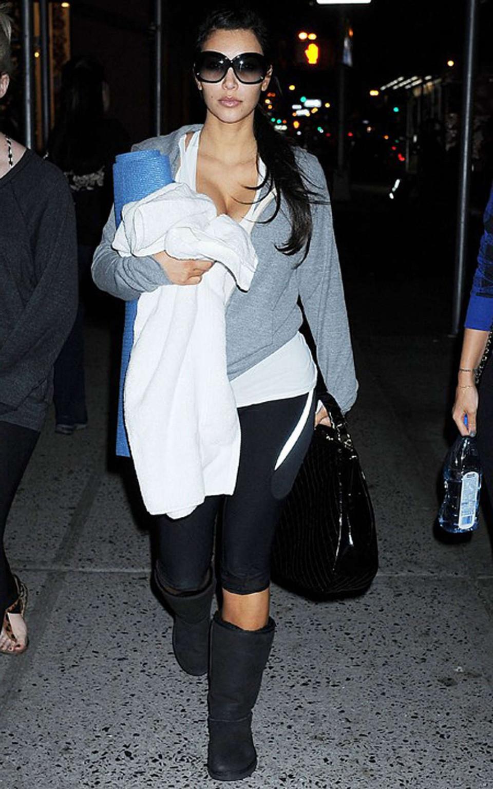 16P Kim Kardashian exposing sexy nude body and huge cleavage while going to yoga cla