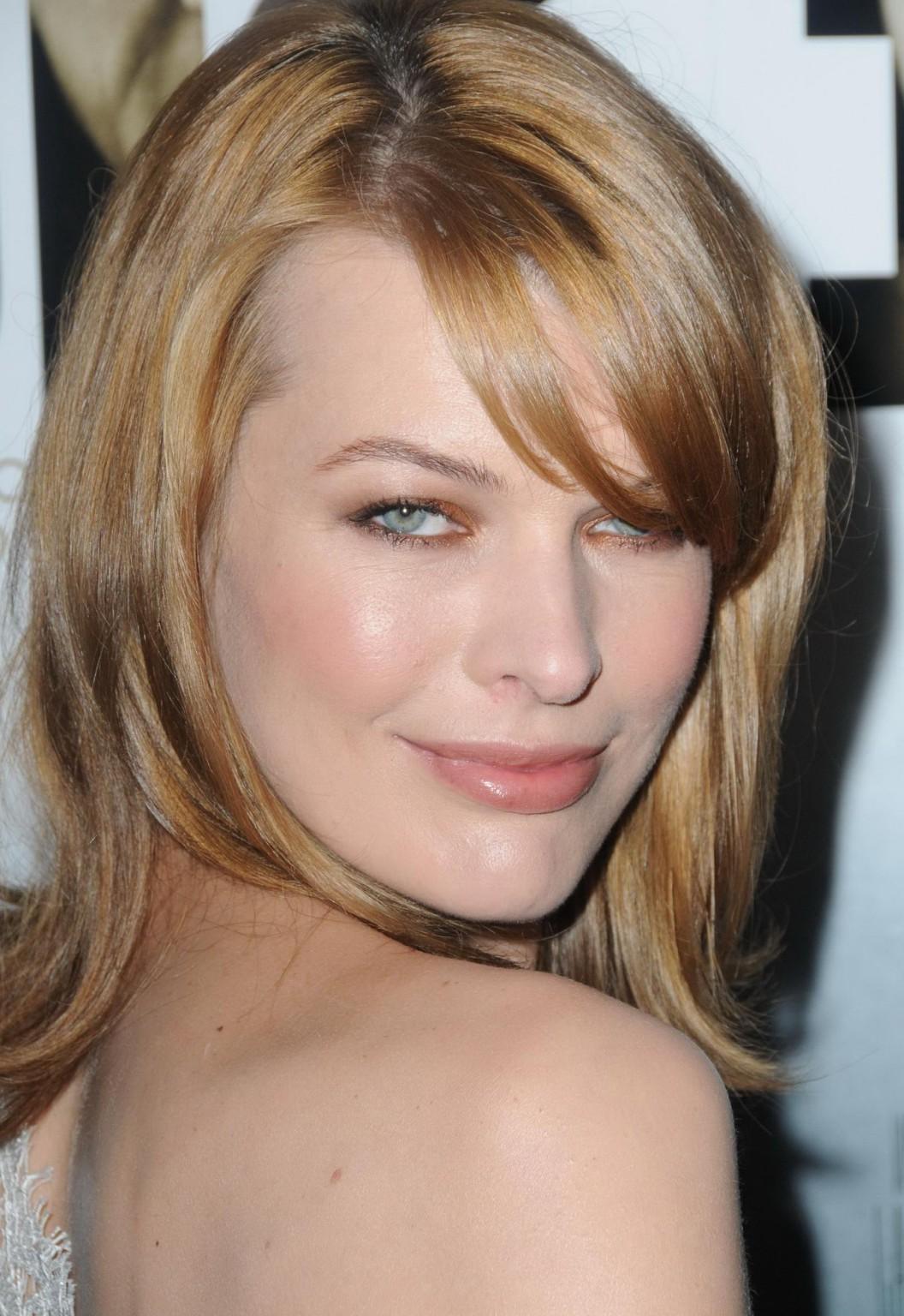 16P Milla Jovovich leggy wearing  tiny white lace dress at the 'Stone' premiere in N