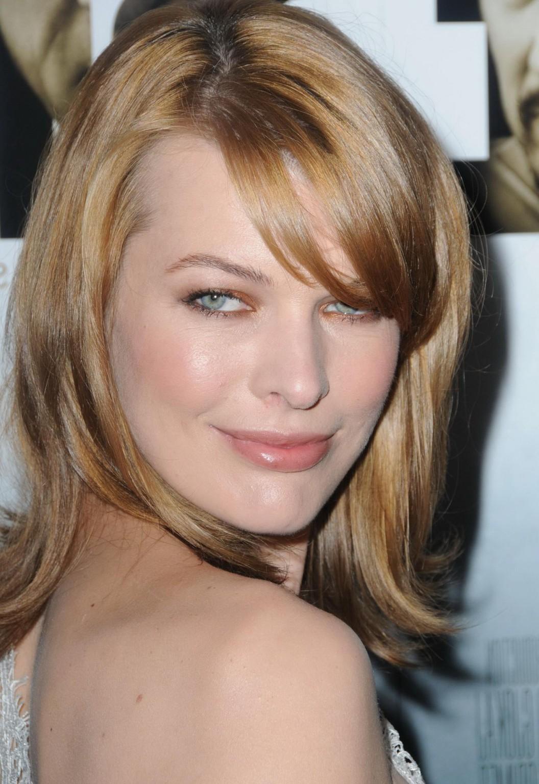 16P Milla Jovovich leggy wearing  tiny white lace dress at the 'Stone' premiere in N