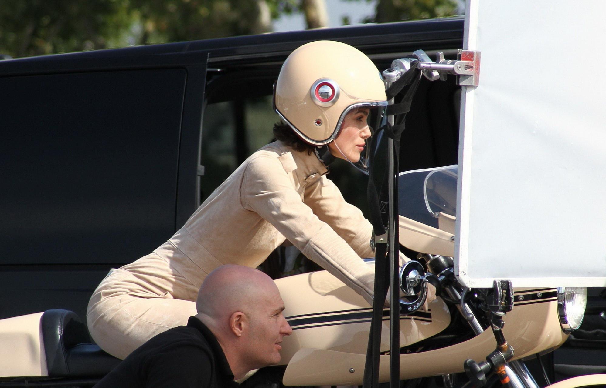 16P Keira Knightley in tight retro motorcycle suit shooting a commercial in Paris