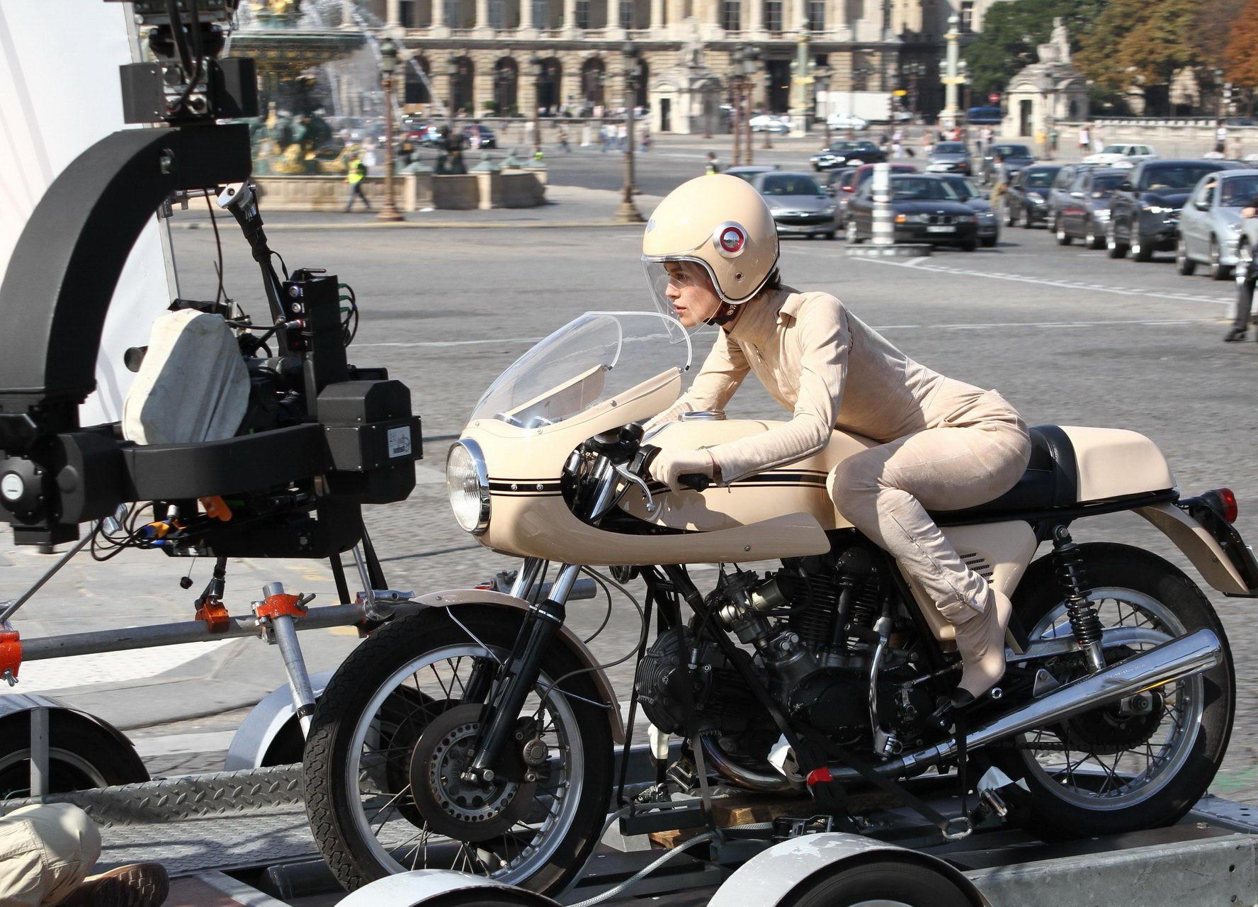 16P Keira Knightley in tight retro motorcycle suit shooting a commercial in Paris