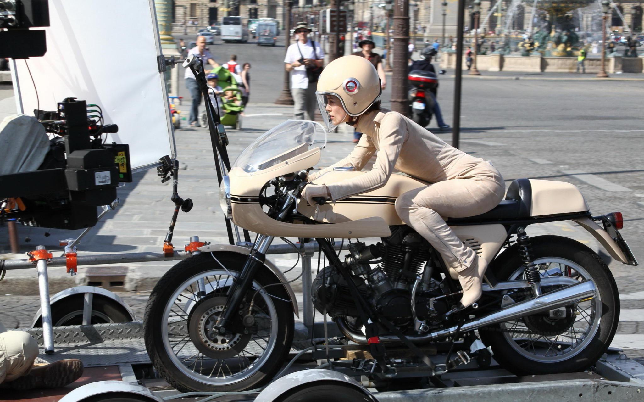 16P Keira Knightley in tight retro motorcycle suit shooting a commercial in Paris
