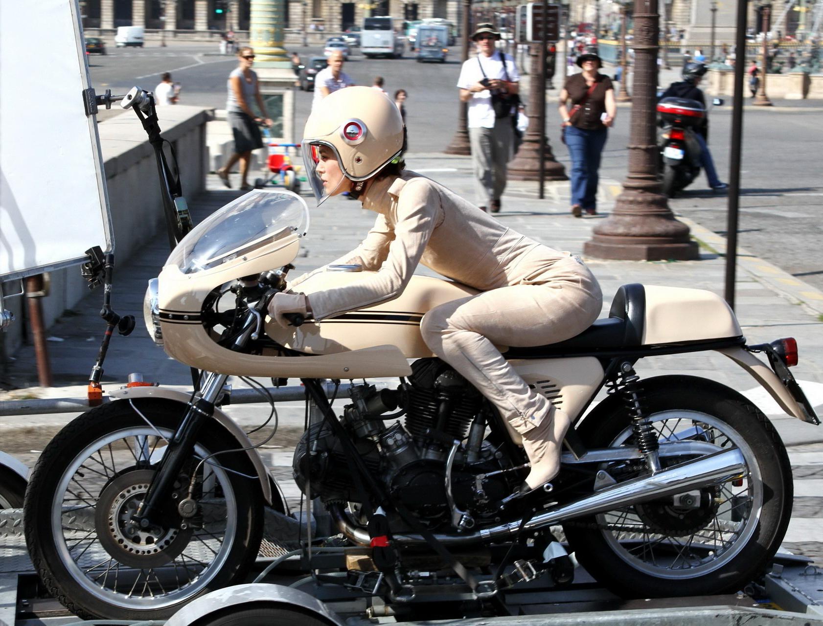 16P Keira Knightley in tight retro motorcycle suit shooting a commercial in Paris