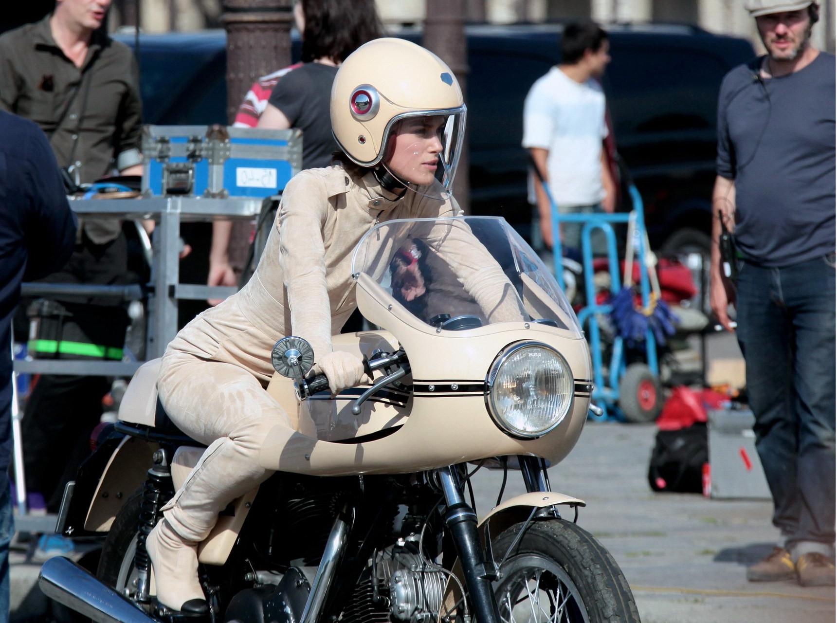 16P Keira Knightley in tight retro motorcycle suit shooting a commercial in Paris
