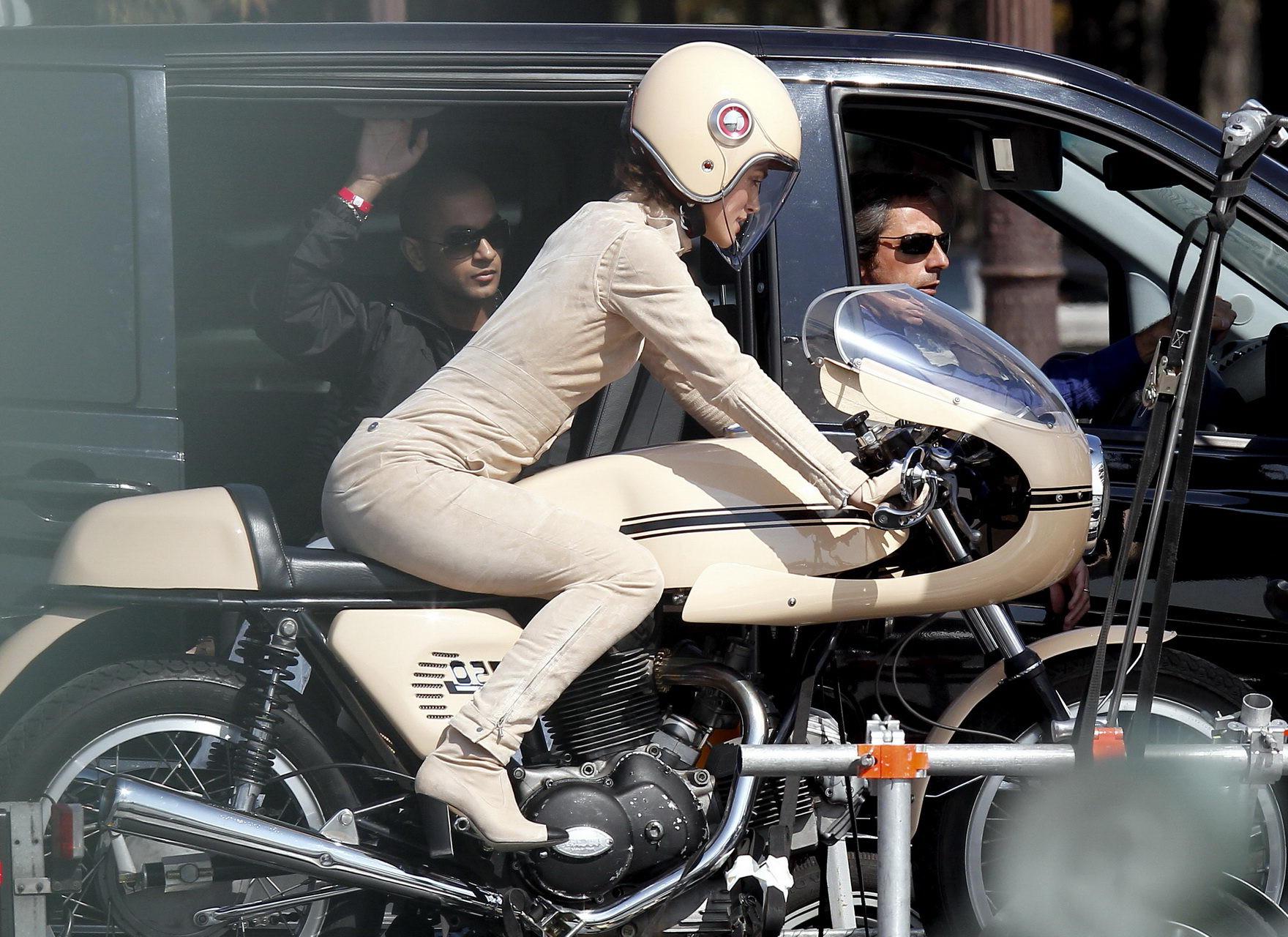 16P Keira Knightley in tight retro motorcycle suit shooting a commercial in Paris