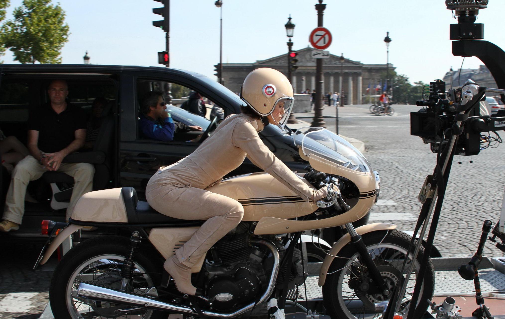 16P Keira Knightley in tight retro motorcycle suit shooting a commercial in Paris