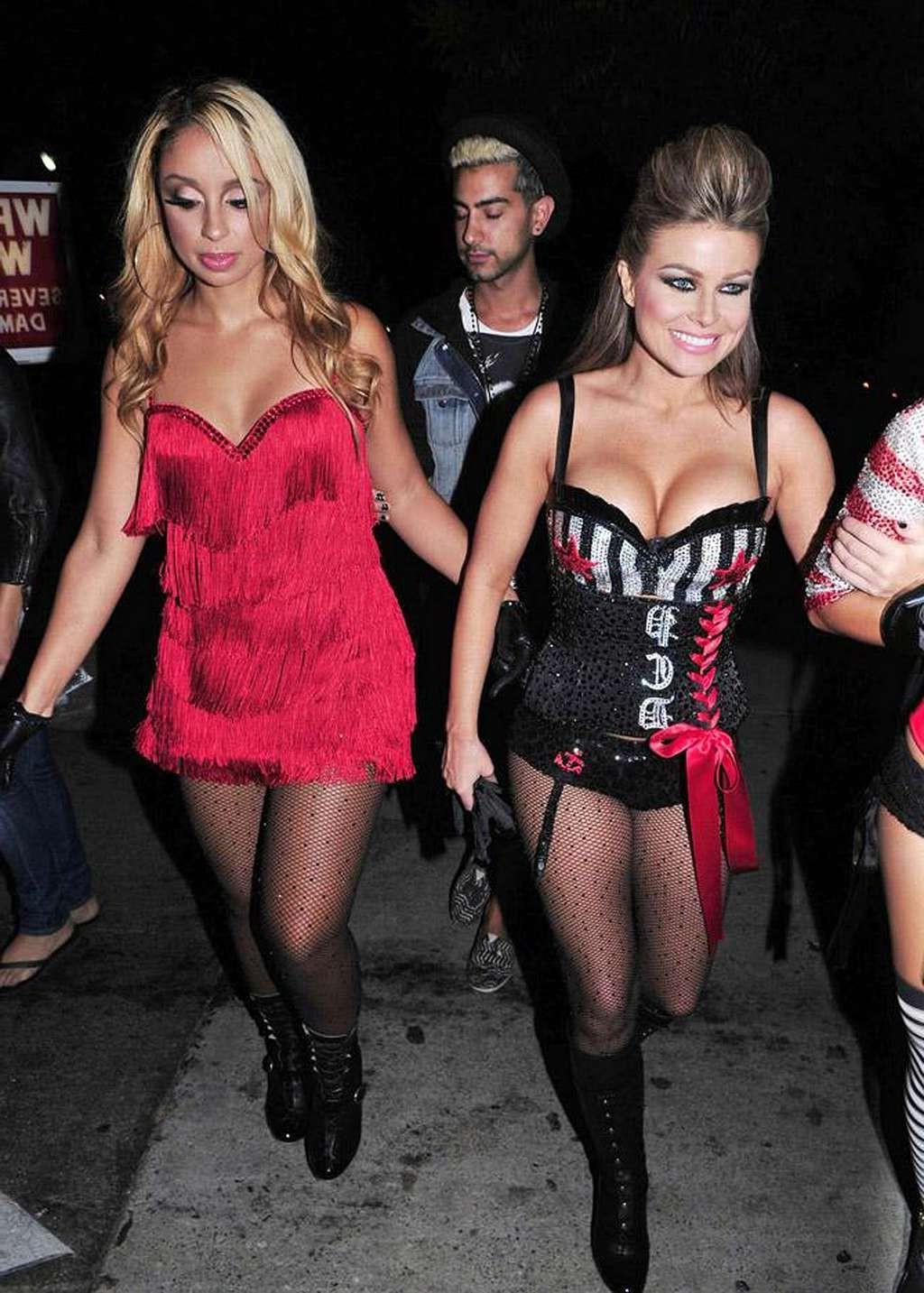 10P Carmen Electra looking sexy and hot in fishnet stockings in public and exposing 