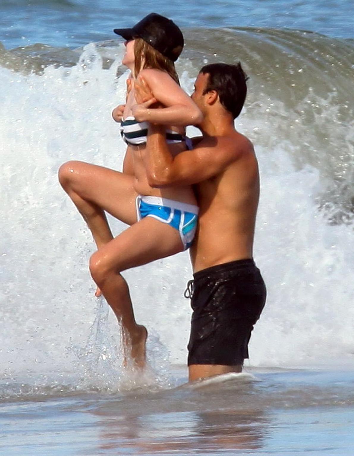 15P Avril Lavigne bikini nip slip at the beach in Malibu