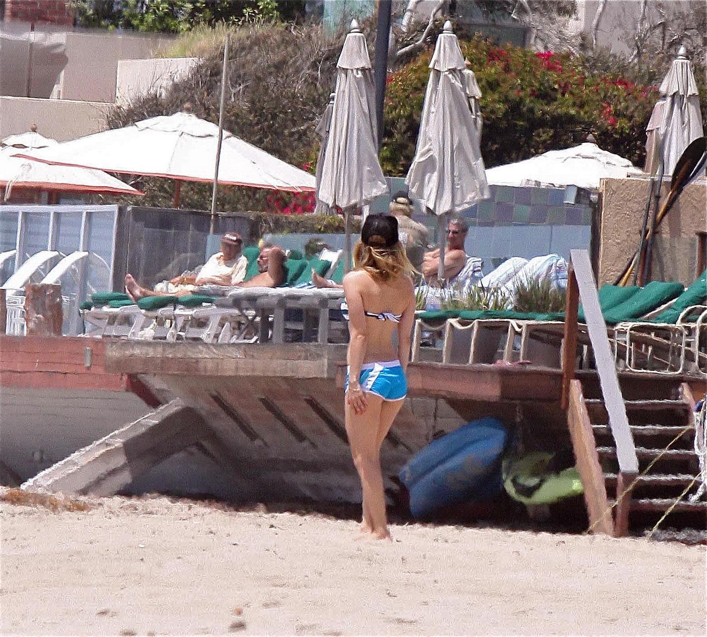 15P Avril Lavigne bikini nip slip at the beach in Malibu