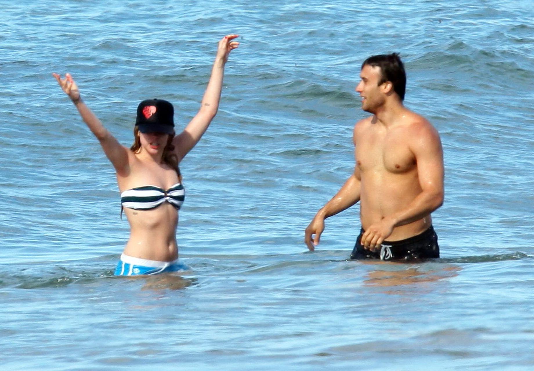 15P Avril Lavigne bikini nip slip at the beach in Malibu
