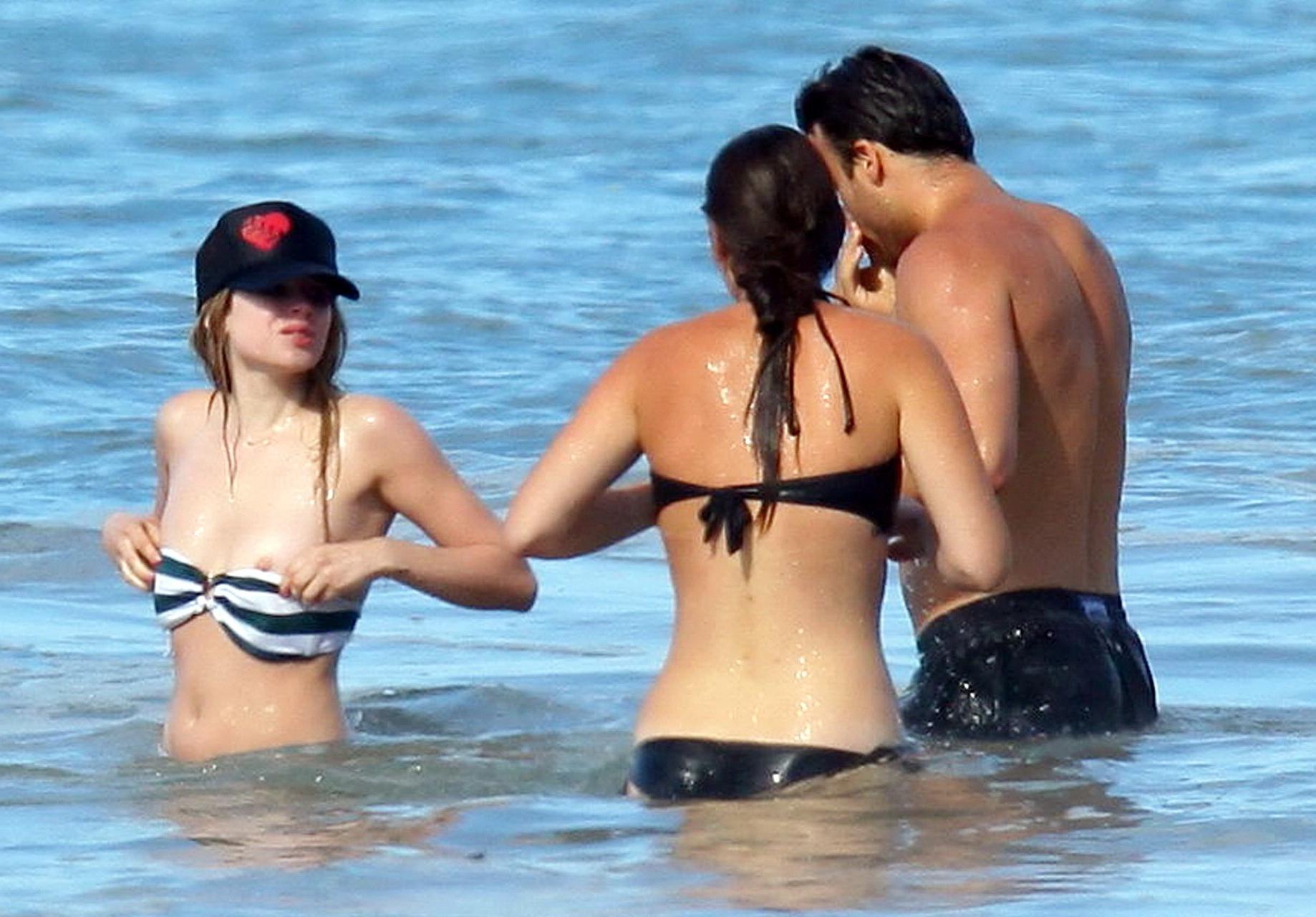 15P Avril Lavigne bikini nip slip at the beach in Malibu