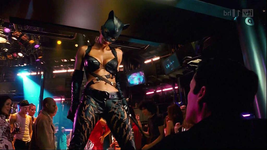 10P Halle Berry showing big cleavage and looking hot in outfit on movie