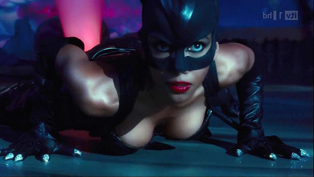 10P Halle Berry showing big cleavage and looking hot in outfit on movie