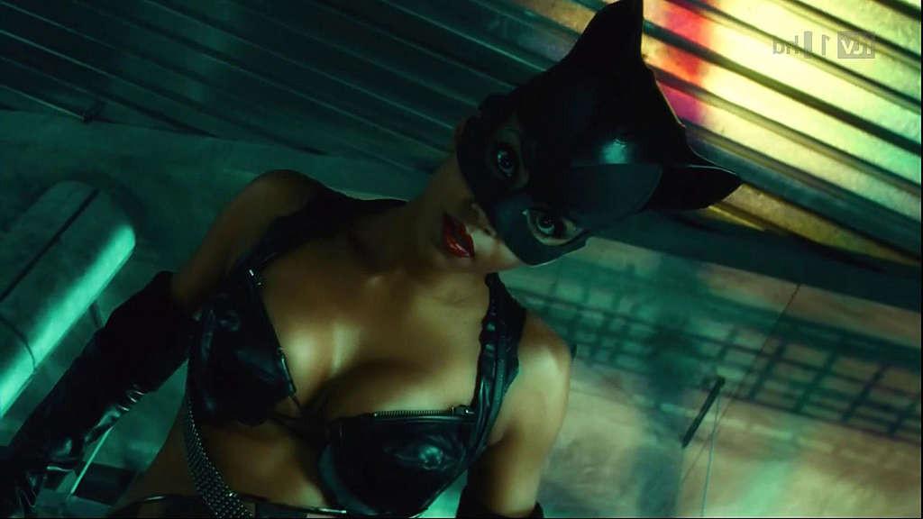 10P Halle Berry showing big cleavage and looking hot in outfit on movie