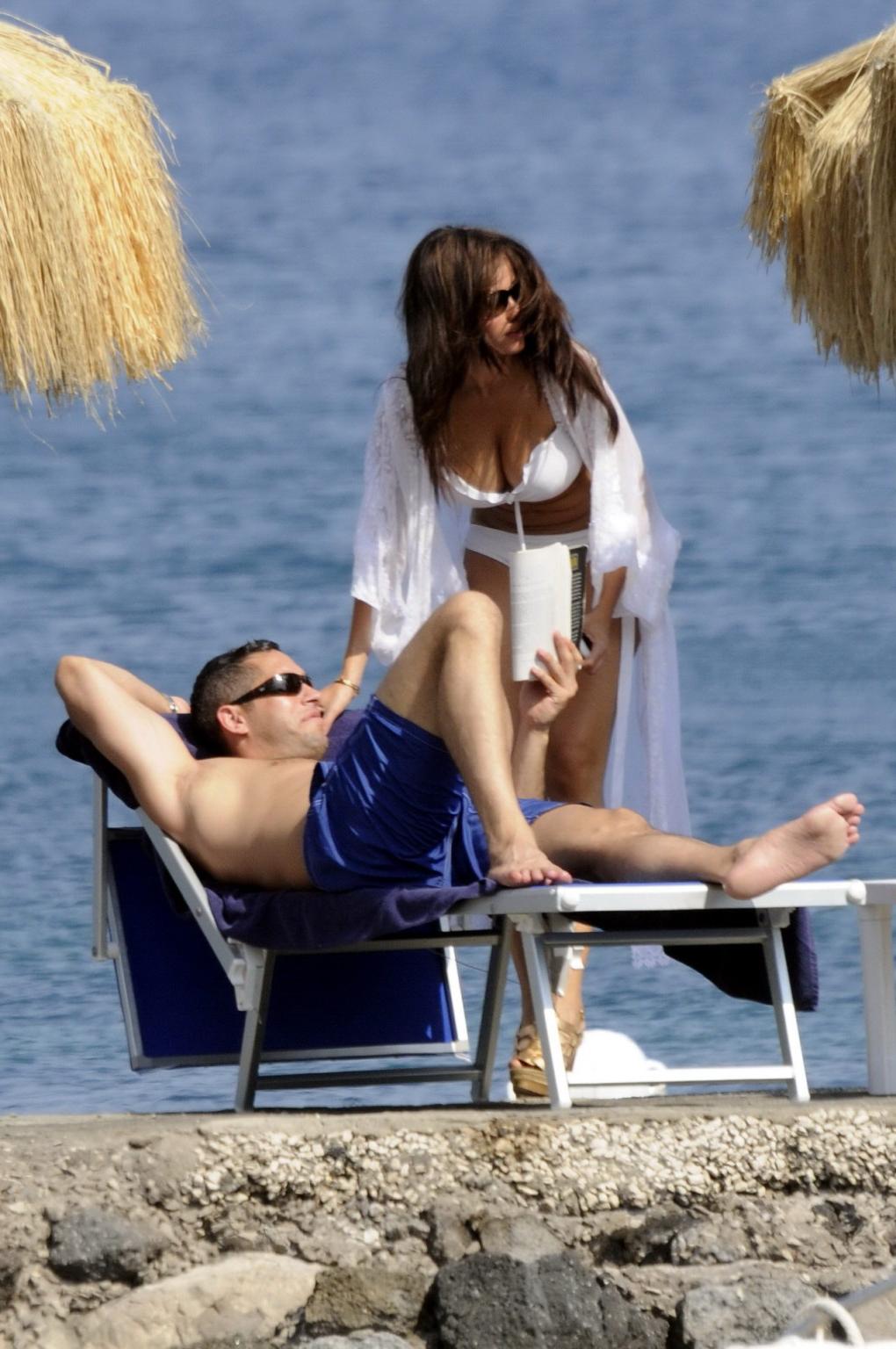 15P Sofia Vergara in skimpy bikini sunning her amazing cleavage at the beach in Isch
