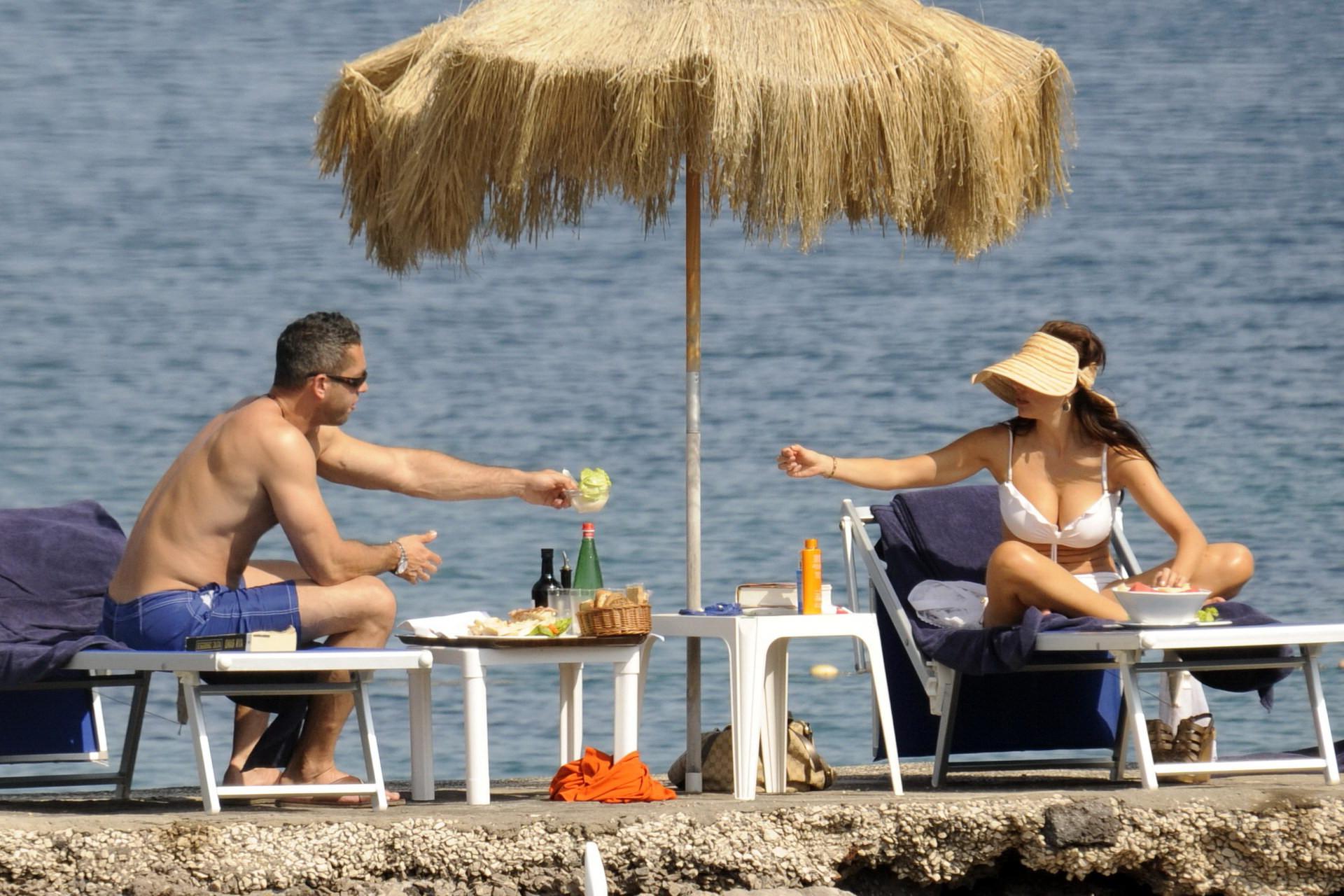 15P Sofia Vergara in skimpy bikini sunning her amazing cleavage at the beach in Isch