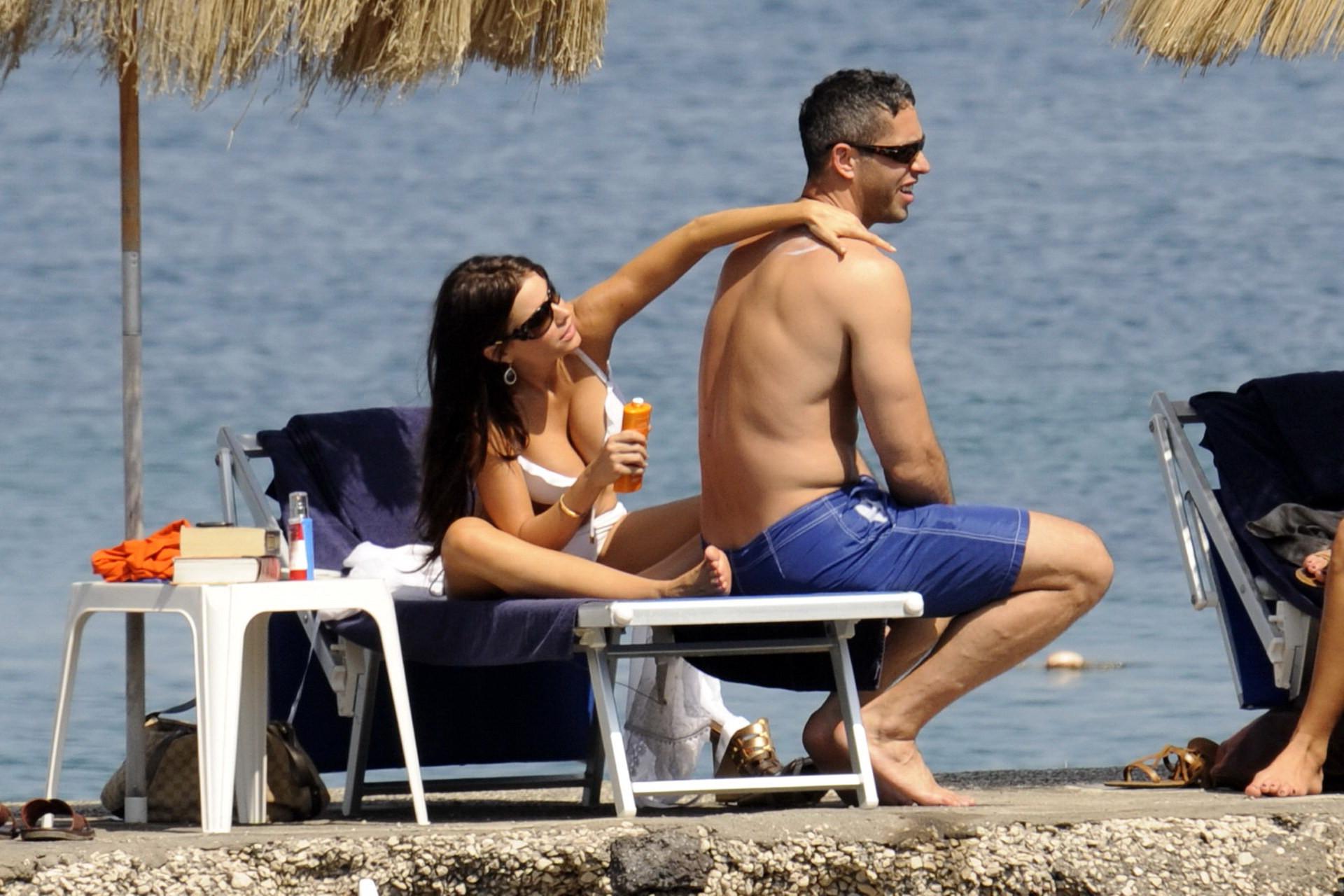 15P Sofia Vergara in skimpy bikini sunning her amazing cleavage at the beach in Isch