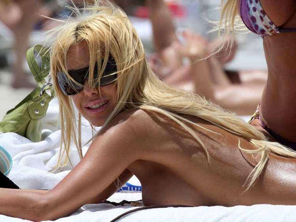 16P Shauna Sand big cleavage and leggy in mini skirt and topless